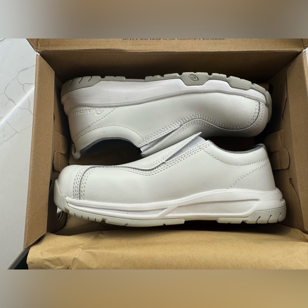 Nautilus White Slip-On Sneakers